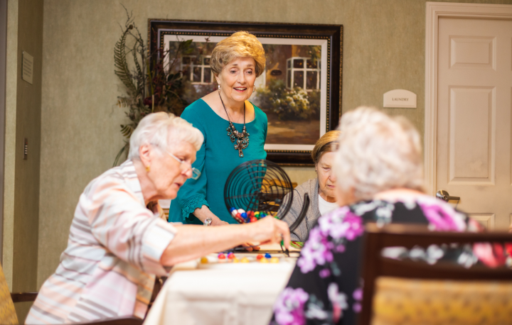 memory care patients playing games at concordia life plan community okc