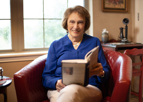 senior woman reading a book