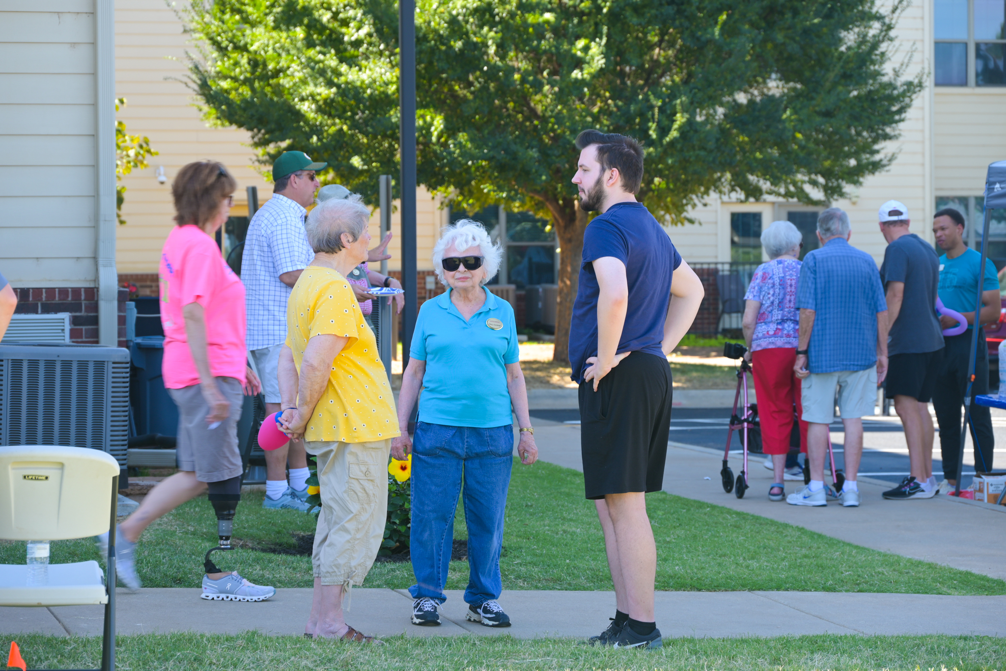 a crowd of people standing around outside